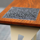 Illustration for article titled Branded With Its Own Blueprints, This Table Could Live Forever